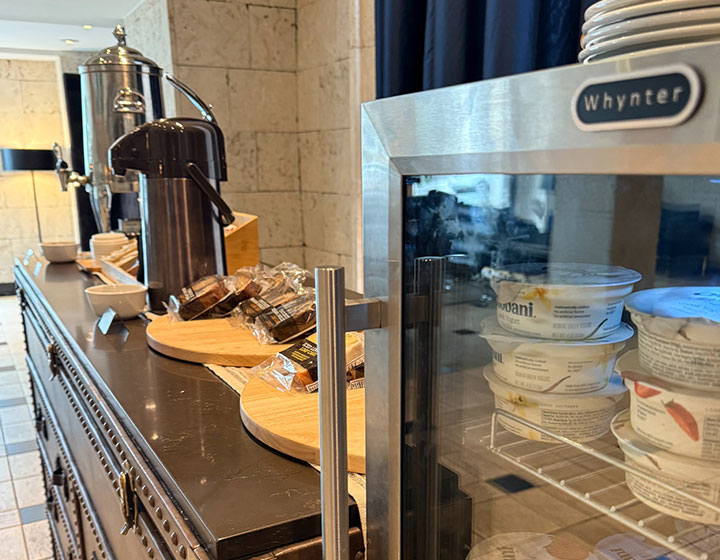 breakfast pastries, coffee, and yogurt