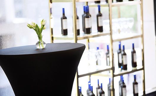 wine bottles on shelf for reception