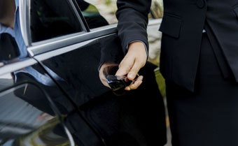 man at car door